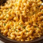 Easy crockpot mac and cheese with smooth cheese sauce and soft pasta