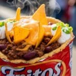 walking frito pie with chili cheese and crunchy corn chips