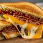 Sun-Dried Tomato Bacon Pesto Grilled Cheese – Crispy, Melty & Packed With Flavor sun-dried tomato bacon pesto grilled cheese with melted cheese