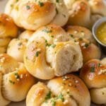 Homemade Easy Garlic Knots – Soft, Fluffy & Full of Garlic Butter Flavor Soft homemade garlic knots brushed with garlic butter and baked golden