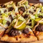 Smash Burger Flatbread Pizza (Big Mac–Inspired, Crispy & Weeknight-Easy) Smash burger flatbread pizza topped with beef cheese pickles lettuce and creamy sauce