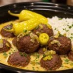 Mississippi meatballs slow cooked in creamy ranch and pepperoncini sauce