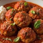 Slow cooker turkey meatballs simmered in homemade marinara sauce served for an easy weeknight dinner