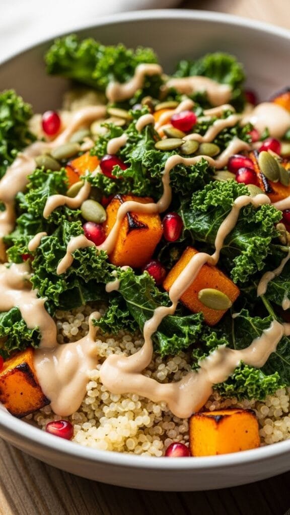 Healthy butternut squash quinoa bowl prepared for meal prep with roasted vegetables and tahini dressing.