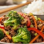 Ground beef and broccoli stir-fry cooked in a garlic soy sauce and served warm