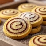 Spiced Pumpkin Pinwheel Cookies Spiced pumpkin pinwheel cookies with cinnamon swirl baked soft with golden edges on tray